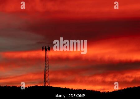 Beautiful Clouds in this Cell Tower Sunrise Landscape. Oregon, Ashland, Cascade Siskiyou National Monument, Fall Stock Photo