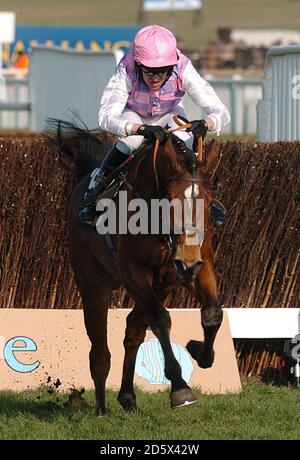 Race winner Star de Mohaison ridden by Barry Geraghty in The Royal and Sunalliance Steeple Chase Stock Photo