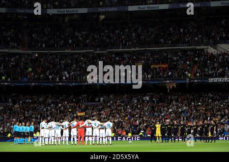 Both teams observe a minutes silence prior to the match Stock Photo