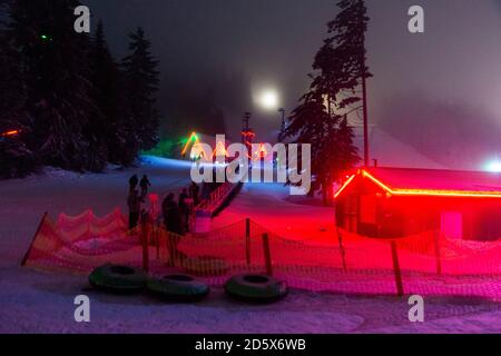 Neon lights on the snowhill at Snow Bowl in Oregon. Stock Photo