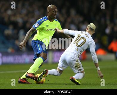 Leeds United's Ezgjan Alioski and Derby County's Andre Wisdom (left) Stock Photo