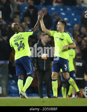 Derby County's Andre Wisdom (left) and Craig Forsyth celebrate after the final whistle Stock Photo