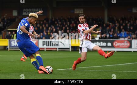 AFC Wimbledon's Lyle Taylor scores their first goal Stock Photo