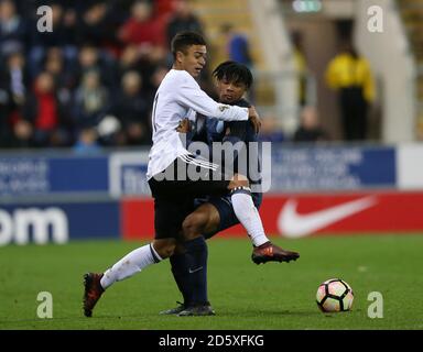 England's Vontae Daley-Campbell (right) and Germany's Oliver Batista Meier battle for the ball Stock Photo