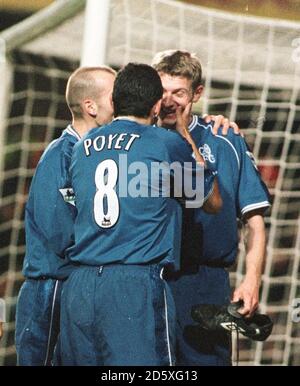 Chelsea's Tore Andre Flo celebrates his winning goal with Gustavo Poyet Stock Photo