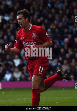 Liverpool's Robbie Fowler celebrates his goal Stock Photo - Alamy