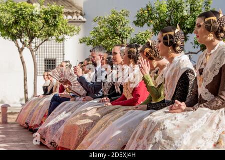 Valencia, Spain, November 30, 2019. Anniversary of the declaration of the Fallas intangible heritage of humanity Celebration, Falleras sitting. Stock Photo