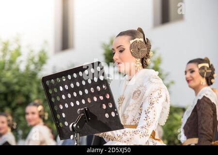 Valencia, Spain, November 30, 2019. Anniversary of the declaration of the Fallas intangible heritage of humanity Celebration. 'Fallera mayor' giving a Stock Photo