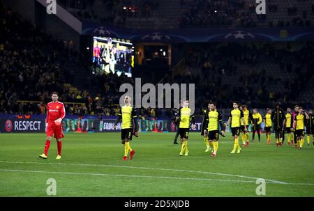 Borussia Dortmund players appear dejected after the final whistle Stock Photo