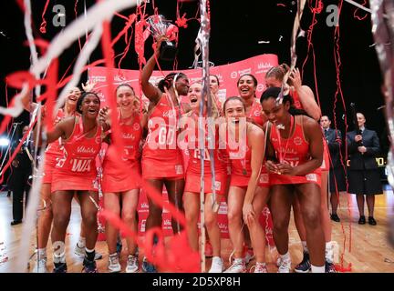England Roses' celebrate winning against Malawi Queens' during the Vitality Netball International Series at the Genting Arena Stock Photo