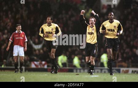 Arsenal's Fredrik Ljungberg (second right) celebrates scoring the opening goal  Stock Photo
