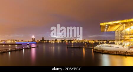 Netherlands, Amsterdam, view to  A'Dam Lookout and Muziekgebouw aan 'T IJ at twilight Stock Photo