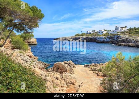 Spain, Mallorca, View to Cala Esmeralda, bay at Cala D'or Stock Photo