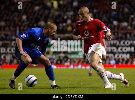 Manchester United's Mikael Silvestre takes on Middlesbrough's Matthew Bates Stock Photo