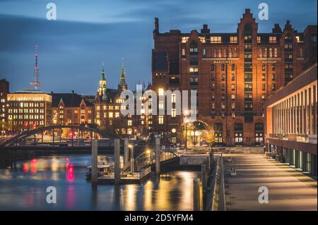 Germany, Hamburg, Elbarkaden and Maritime Museum at blue hour Stock Photo