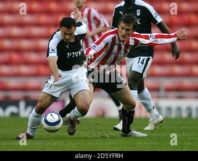 Fulham's Steed  Malbranque and Sunderland's  Dean  Whitehead Stock Photo