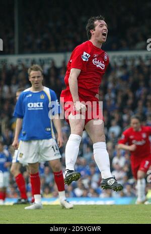 Liverpool's Robbie Fowler celebrates his goal with Peter Crouch Stock
