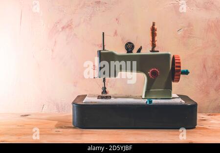 Vintage toy sewing machine Stock Photo