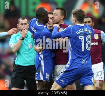 Aston Villa's John Terry (centre right) and Birmingham City's Cheikh N'Doye (centre left) clash leading to the later receiving a red card Stock Photo