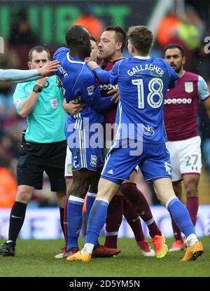 Aston Villa's John Terry (centre right) and Birmingham City's Cheikh N'Doye (centre left) clash leading to the later receiving a red card Stock Photo