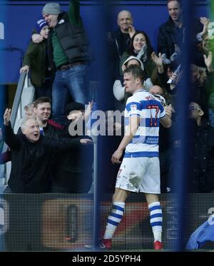 Queens Park Rangers' Matt Smith celebrates with fans after scoring the second goal against Bolton Wanderers Stock Photo