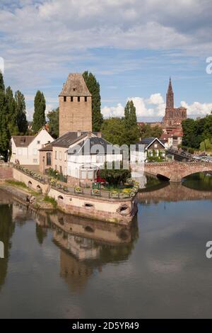 France, Strasbourg, Covered stone bridges and towers in Peteite France at Ill river Stock Photo