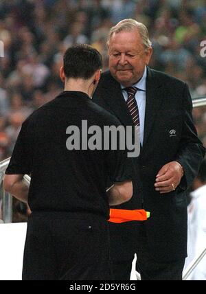 UEFA President Lennart Johansson presents medals to the officials Stock Photo