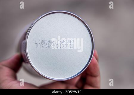 Packaged Date and Expire Date information on the bottom of the canned frozen food. Stock Photo