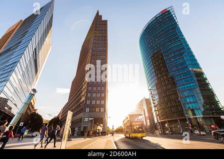 Germany, Berlin, Potsdamer Platz, skyscrapers and double-decker bus at backlight Stock Photo