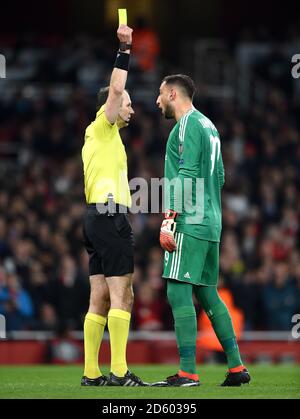 AC Milan goalkeeper Gianluigi Donnarumma saves during a warm up prior