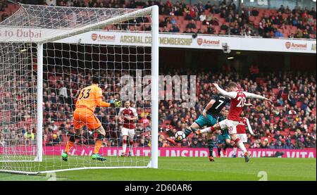 Southampton's Shane Long (centre) scores his team's first goal of the game  Stock Photo