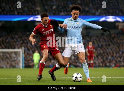 Liverpool's Trent Alexander-Arnold (left) and Manchester City's Leroy Sane battle for the ball Stock Photo