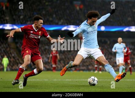 Liverpool's Trent Alexander-Arnold (left) and Manchester City's Leroy Sane battle for the ball Stock Photo