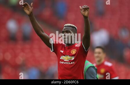 Manchester United's Paul Pogba celebrates after the final whistle Stock Photo