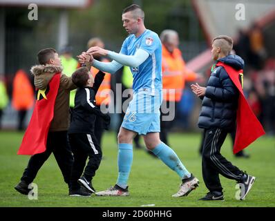 Coventry City s Jordan Shipley with young fans wearing fancy dress after the final whistle of the Sky Bet League Two match at the LCI Rail Stadium Cheltenham Stock Photo Alamy