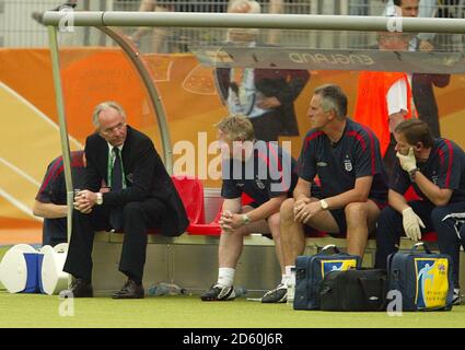 England head coach Sven Goran Eriksson looks on from the bench Stock Photo