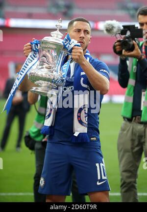 Chelsea's Eden Hazard celebrates with champagne after the game Stock Photo