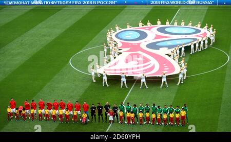 The two team's line-up before kick-off in front of a giant FIFA World Cup 2018 logo Stock Photo