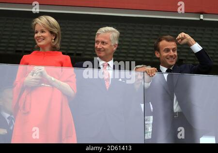 Belgium's Queen Mathilde, Belgium's King Philippe, and French President Emmanuel Macron in the stands Stock Photo