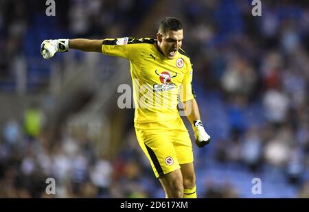 Reading goalkeeper Vito Mannone celebrates after team-mate Jon Dadi Bodvarsson scores his side's first goal of the game Stock Photo