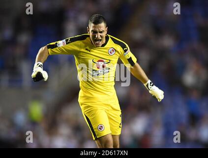 Reading goalkeeper Vito Mannone celebrates after team-mate Jon Dadi Bodvarsson scores his side's first goal of the game Stock Photo