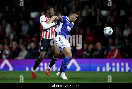 Birmingham City's Che Adams, (right) battles for possession of the ball with Brentford's Romaine Sawyers Stock Photo