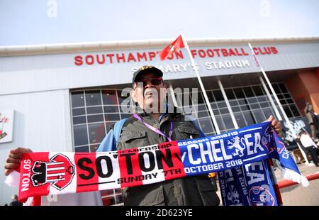 Half and half match scarves for sale outside the ground Stock Photo