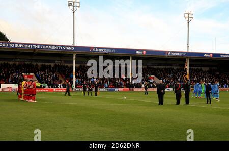 The Walsall and Coventry City teams observe a minutes silence before kick off to mark the armistice centenary. Stock Photo