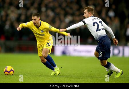 Chelsea's Eden Hazard (left) and Tottenham Hotspur's Christian Eriksen (right) battle for the ball Stock Photo