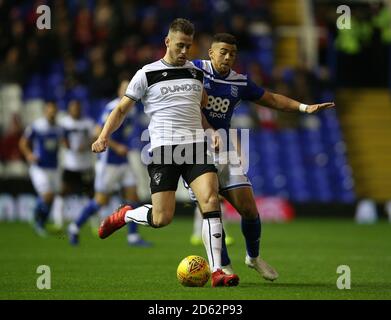 Birmingham City's Che Adams (right) and Bristol City's Adam Webster battle for the ball Stock Photo