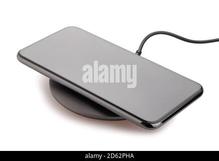 smartphone on wireless charger path isolated on white Stock Photo