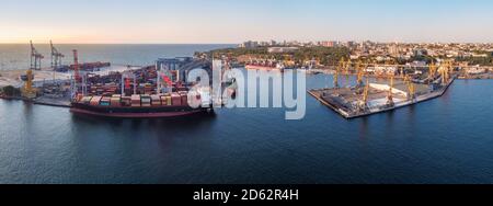 container ship at odessa port panorama at sunrise Stock Photo