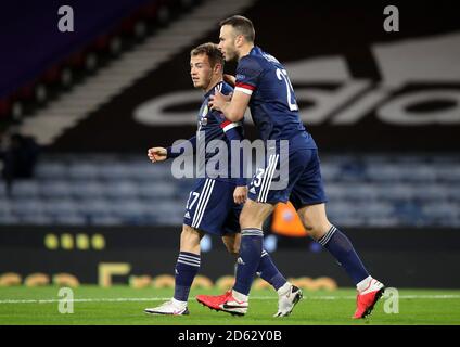 Scotland's Ryan Fraser (left) celebrates scoring his side's first goal of the game with team-mate Andrew Considine during the UEFA Nations League Group 2, League B match at Hampden Park, Glasgow. Stock Photo