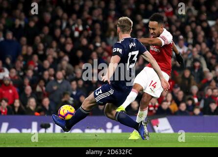 Arsenal's Pierre-Emerick Aubameyang (right) scores his side's fourth goal of the game Stock Photo